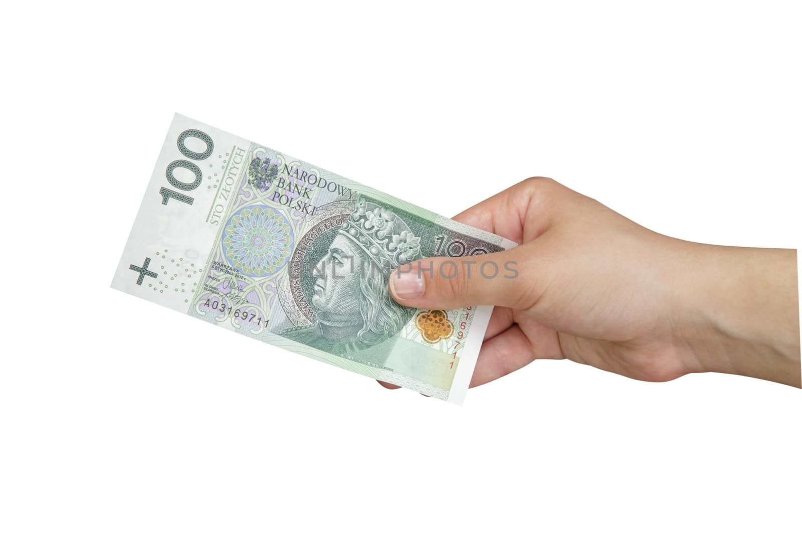 Hand taking a banknote of 100 polish zloty