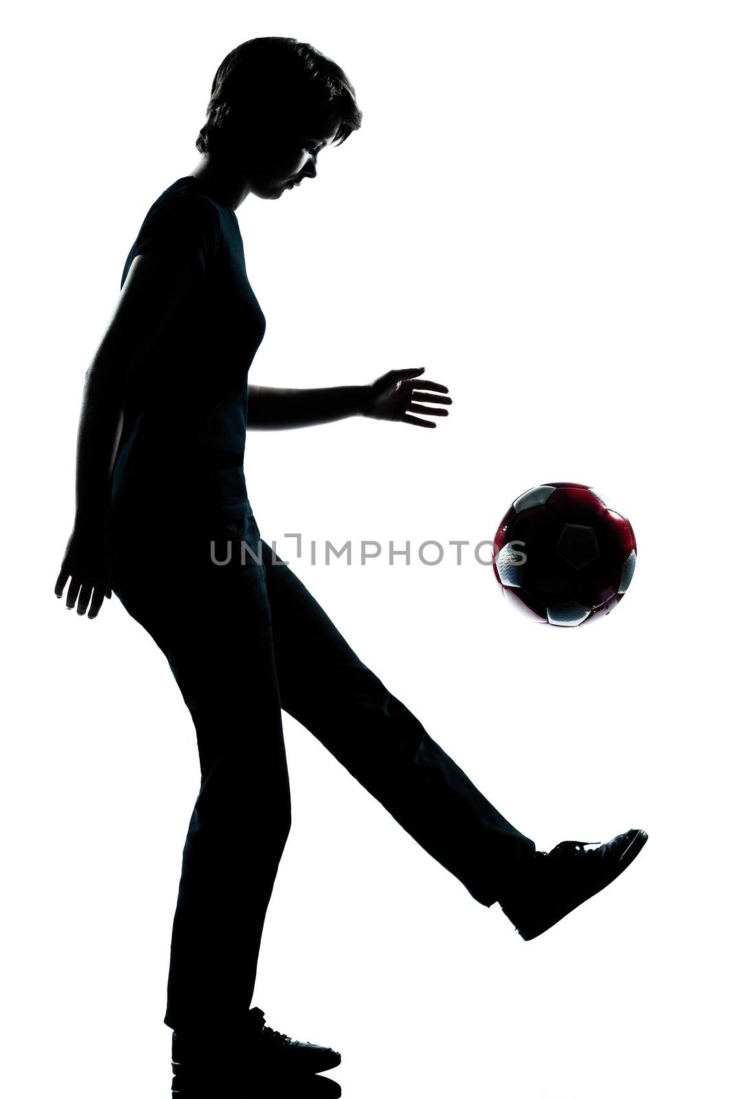 one  young teenager silhouette girl juggling soccer football full length in studio cut out isolated on white background