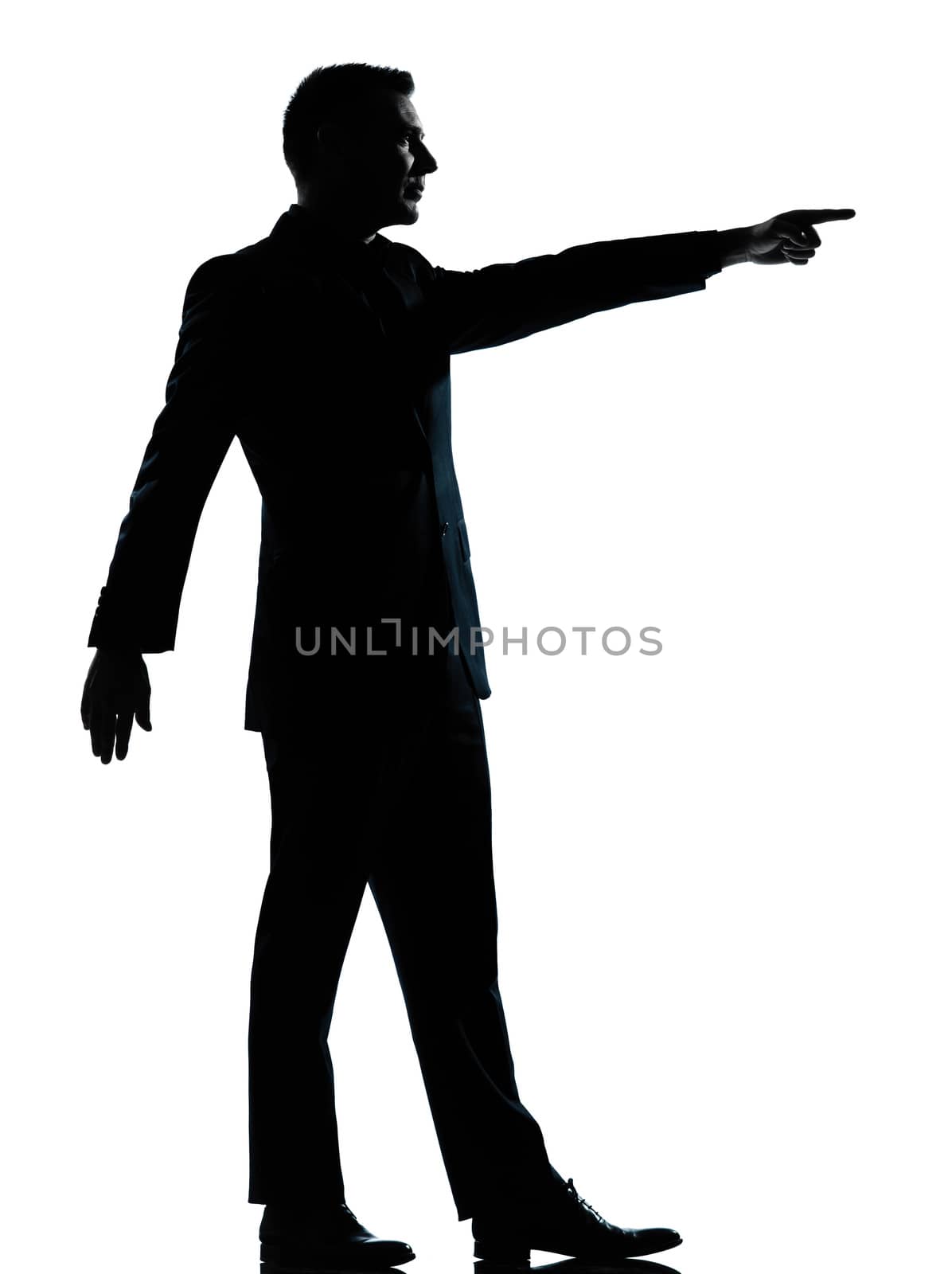 one  business man silhouette standing pointing Full length in studio isolated on white background