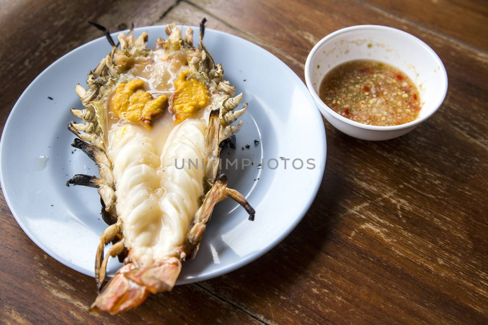 Big prawn on dish with spicy sauce by 2nix