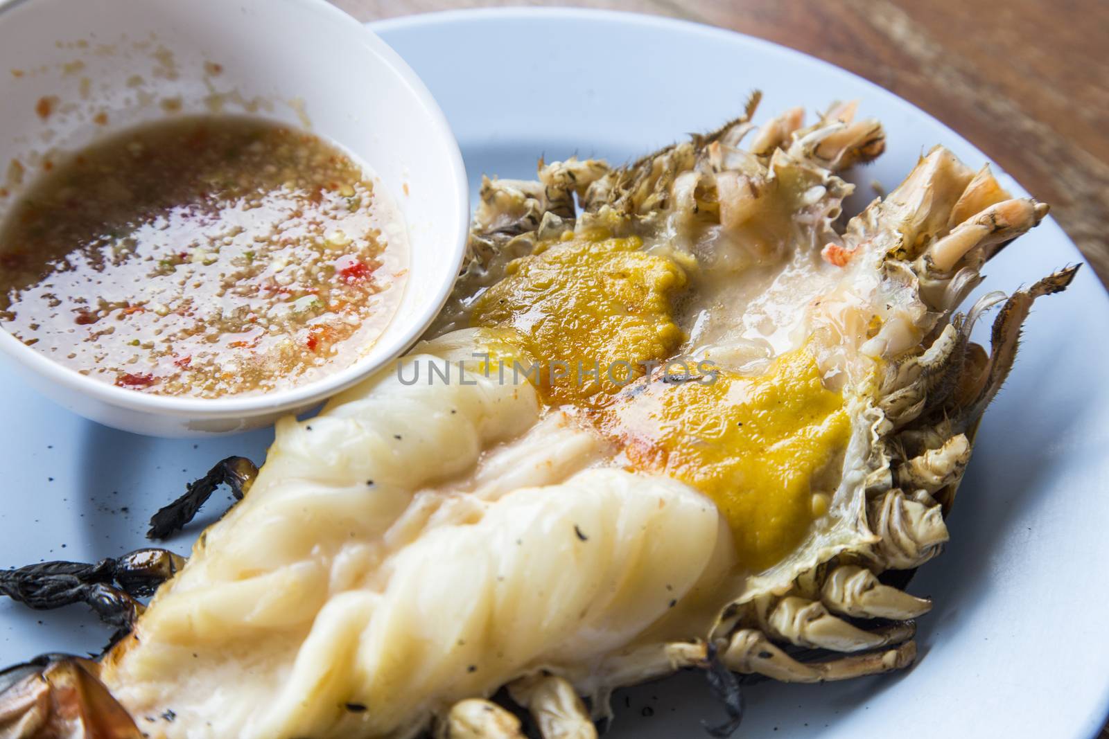 Big prawn on dish with spicy sauce by 2nix