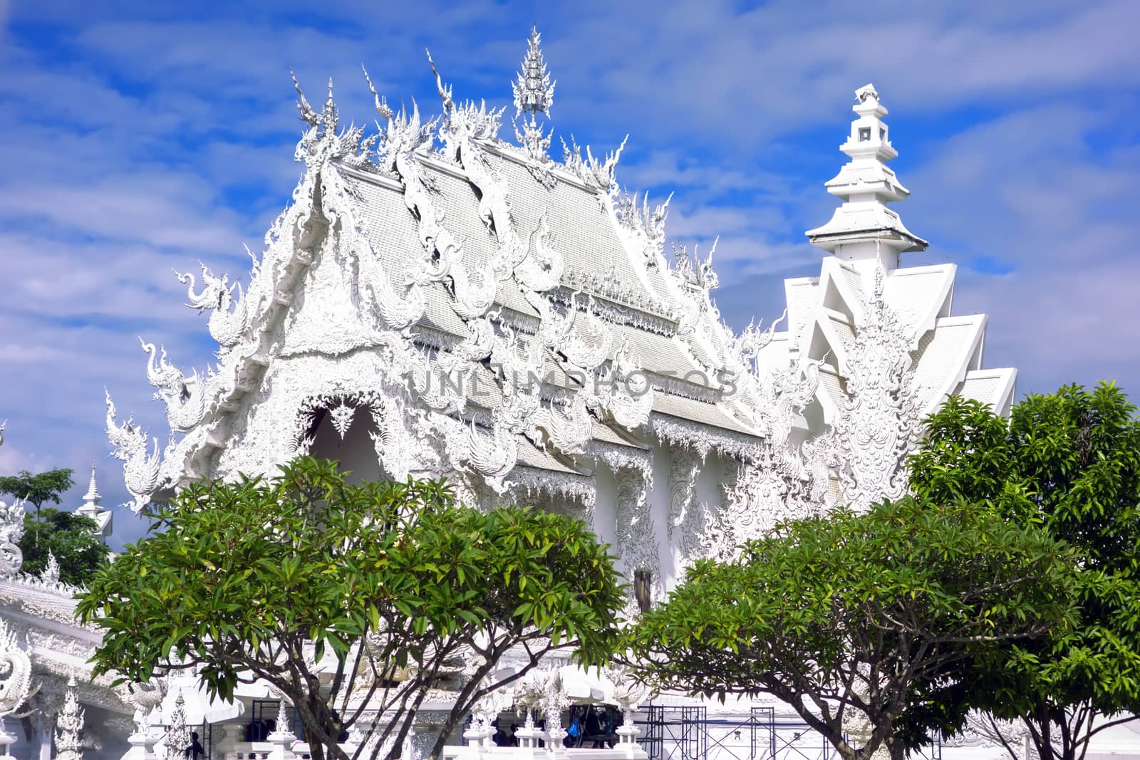 Wat Rong Khun Recovery after Earthquake. More well-known among foreigners as the White Temple, is a contemporary unconventional Buddhist temple in Chiang Rai, Thailand