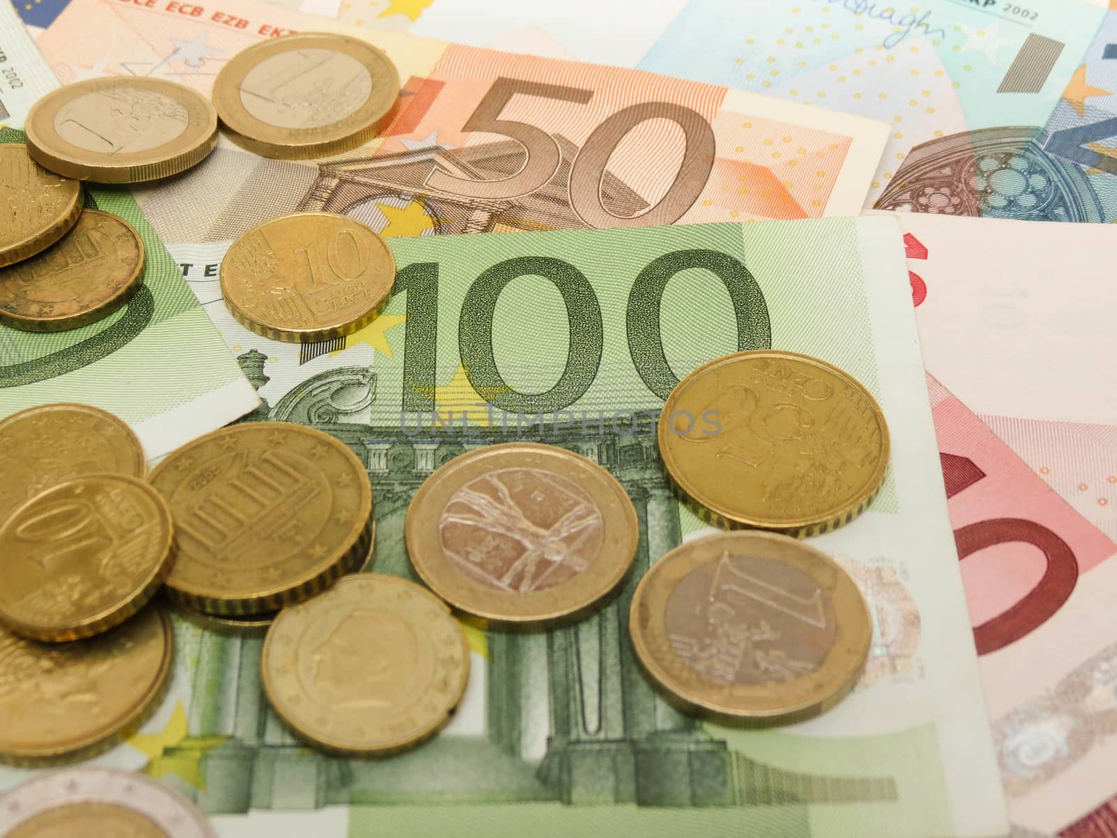 Euro banknotes and coins by paolo77