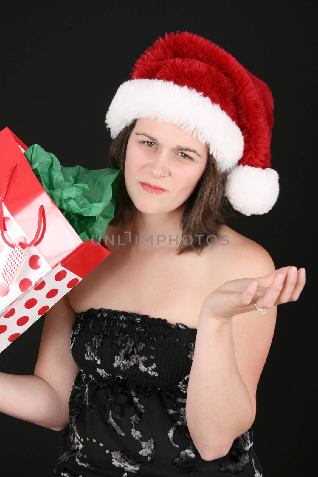 Brunette female dissapointed with her christmas gift