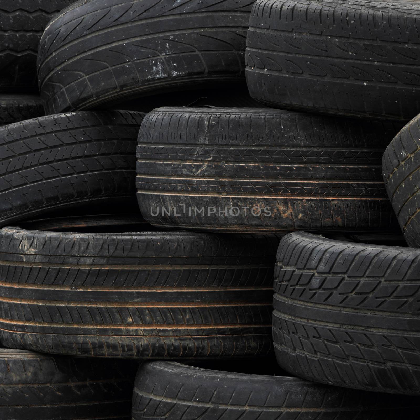 Pile of old rubber tires for background