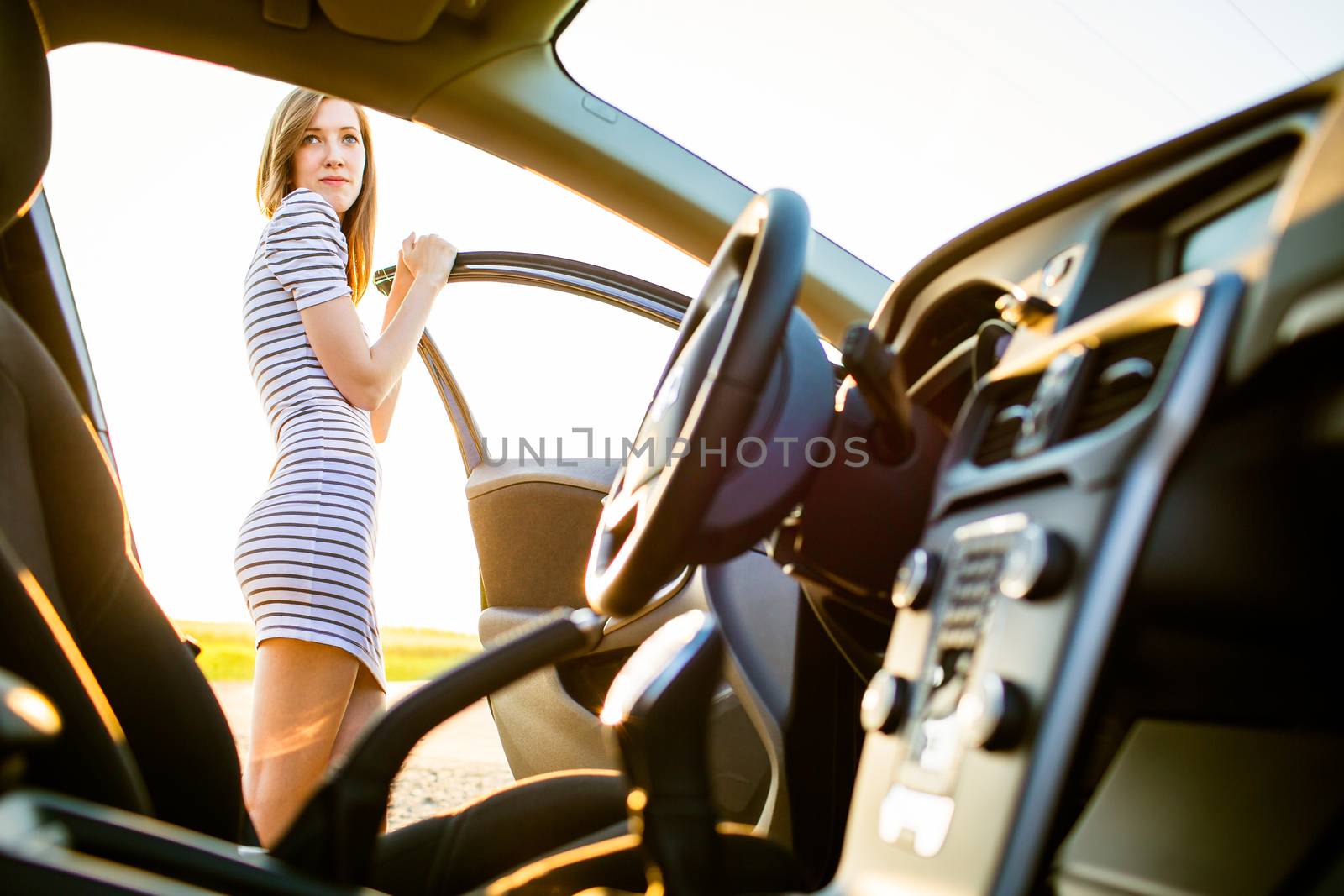 Portrait of a pretty, female teen driver, by her new car by viktor_cap