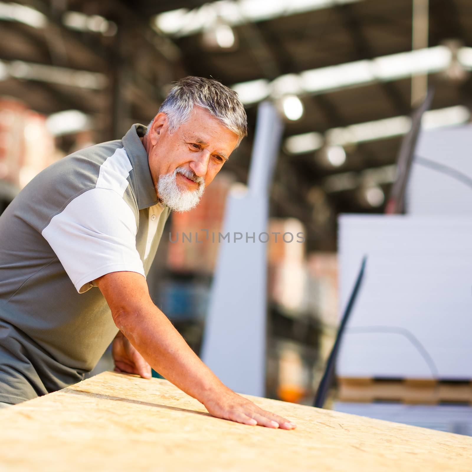 Man choosing and buying construction wood in a  DIY store by viktor_cap