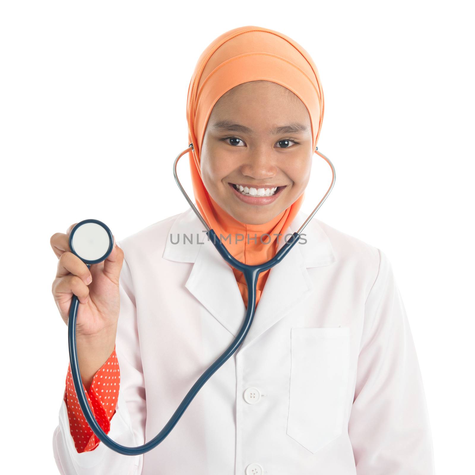 Young Muslim female doctor portrait, holding stethoscope standing isolated on white background.
