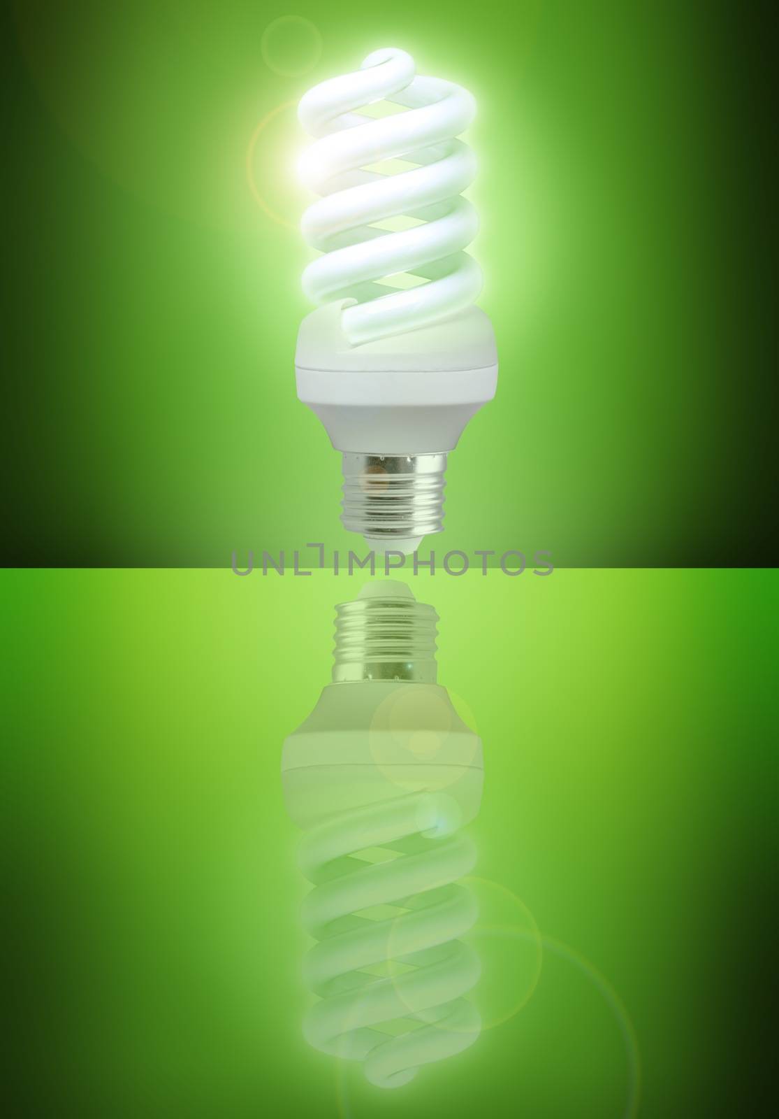 Picture of an eco-save bulb in green background.