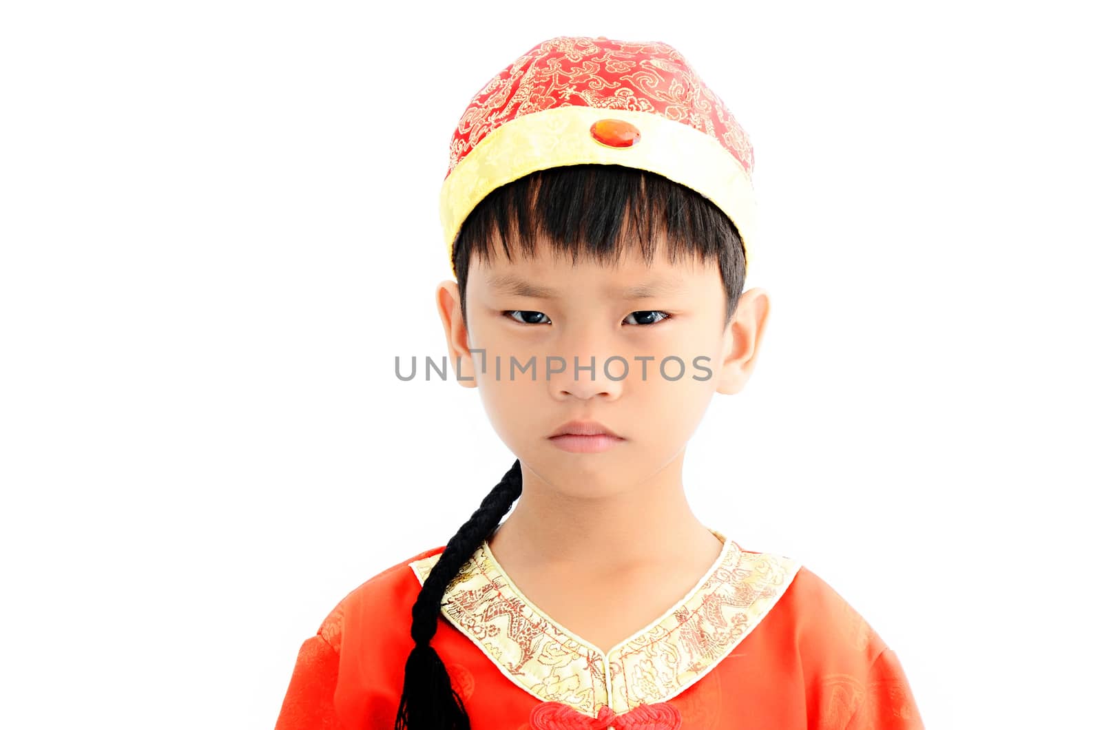 China boy in traditional Chinese red Tang suit greeting