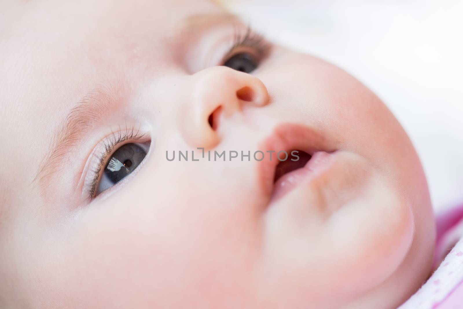 macro of adorable baby girl eye with shallow focus