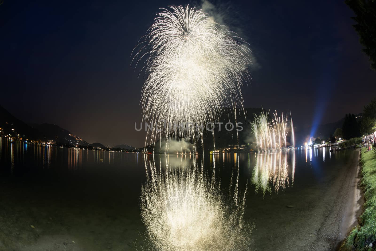 Fireworks on the Lugano Lake in a summer evening, Lavena-Ponte Tresa