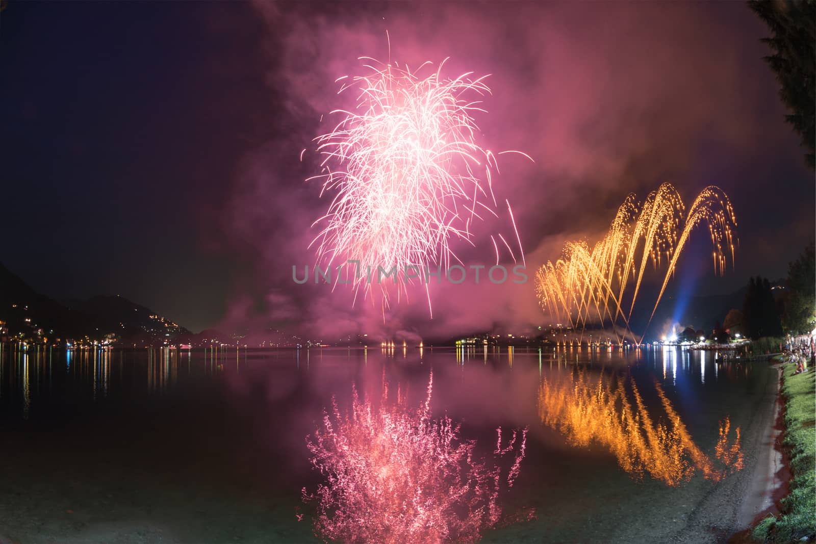 Fireworks on the Lugano Lake in a summer evening, Lavena-Ponte Tresa