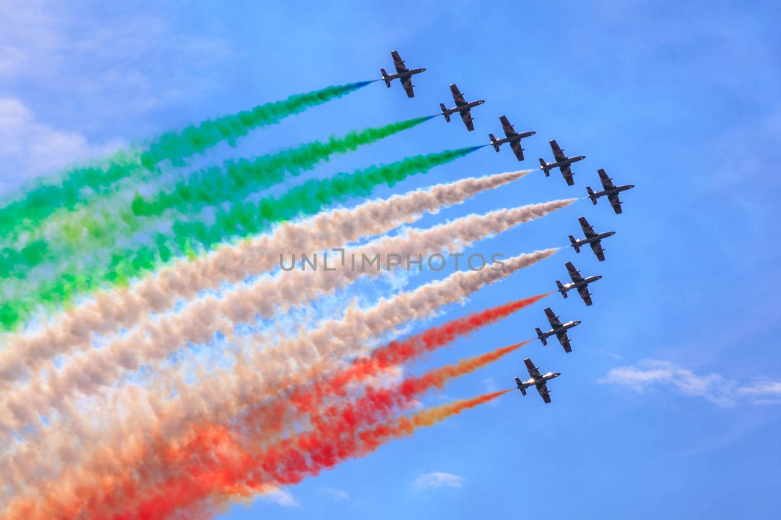 TRIESTE, ITALY - JUNE, 01: View of Italian military airplane called frecce tricolore "tricolor arrows" in acrobatics on June 01, 2014