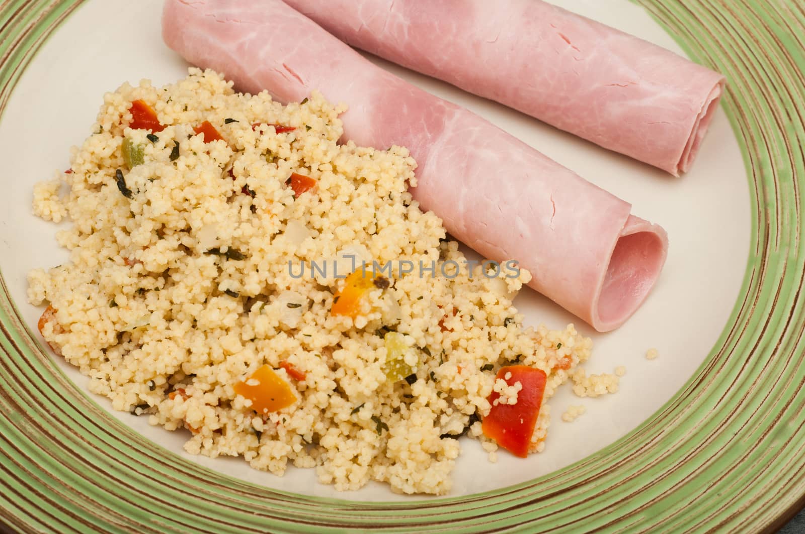 tabbouleh, and jam in plate