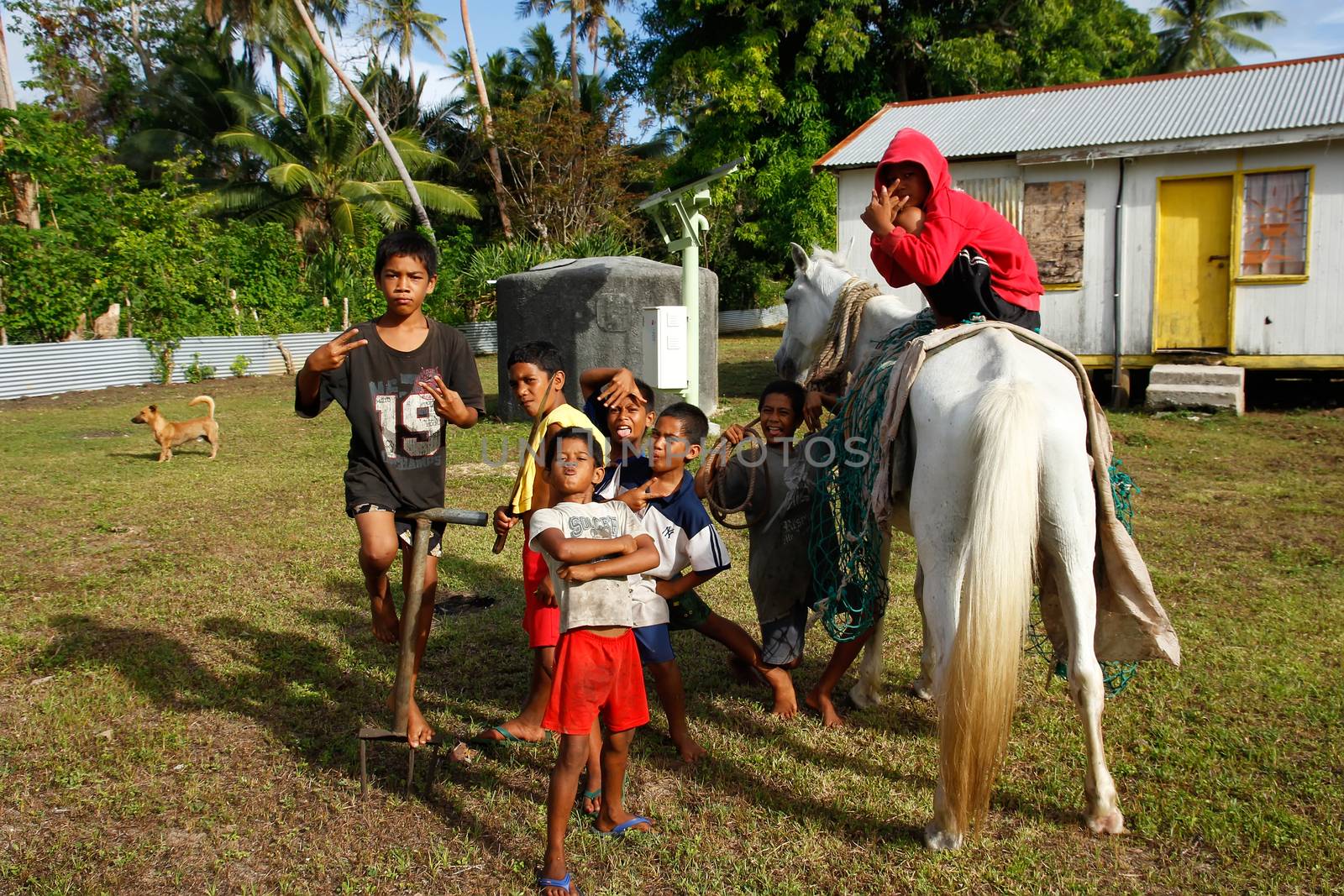 Local boys posing on Ofu island, Tonga by donya_nedomam