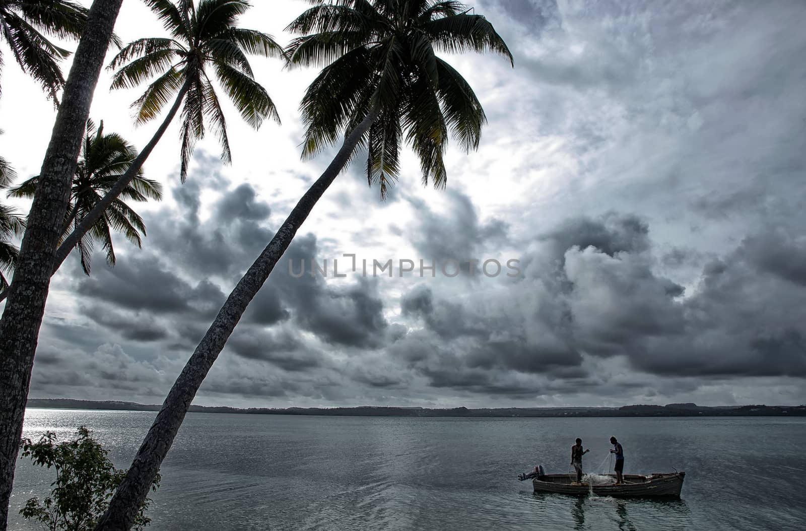 Local fishermen in a boat, Ofu island, Vavau group, Tonga
