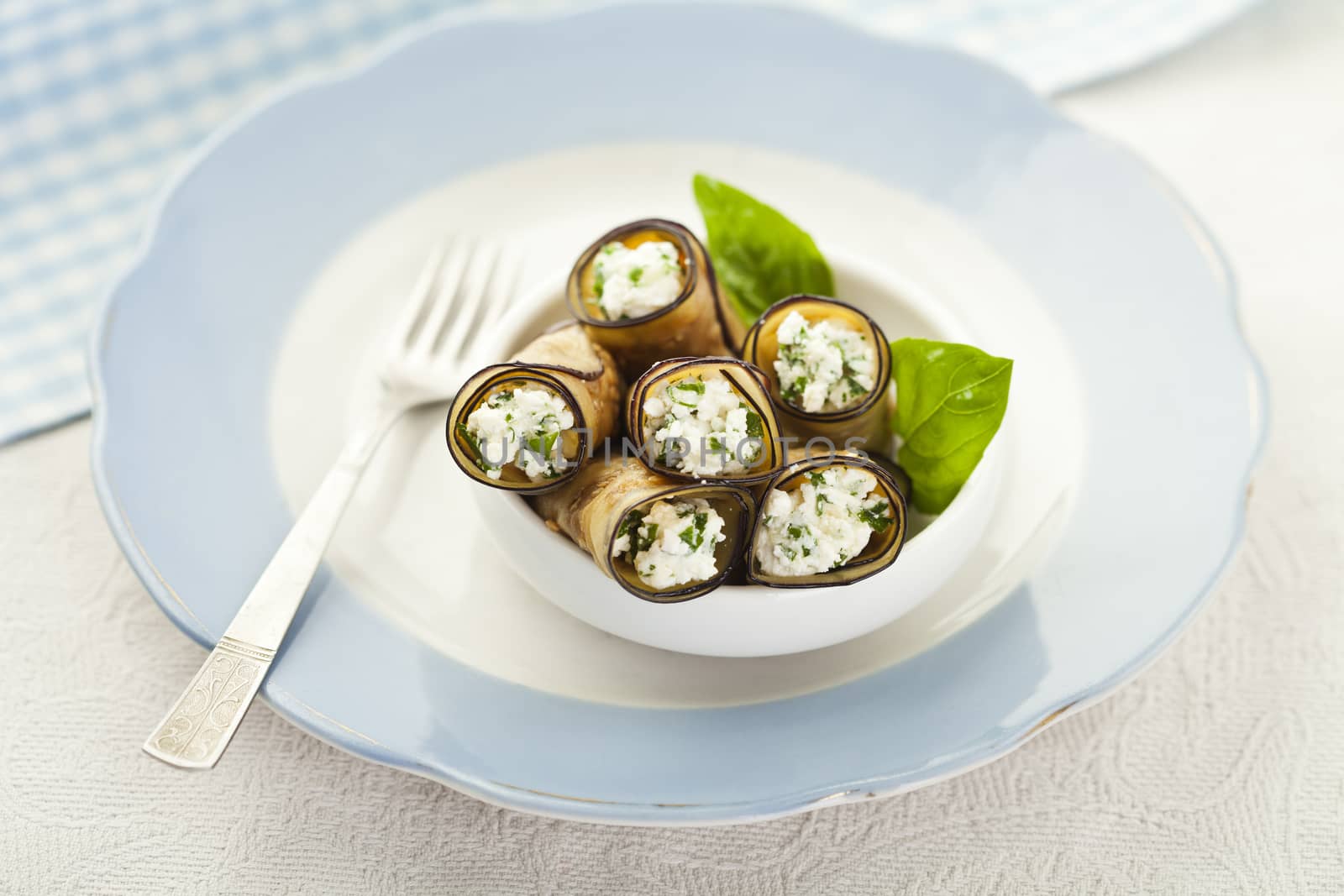 Tasty eggplant rolls stuffed with cottage cheese