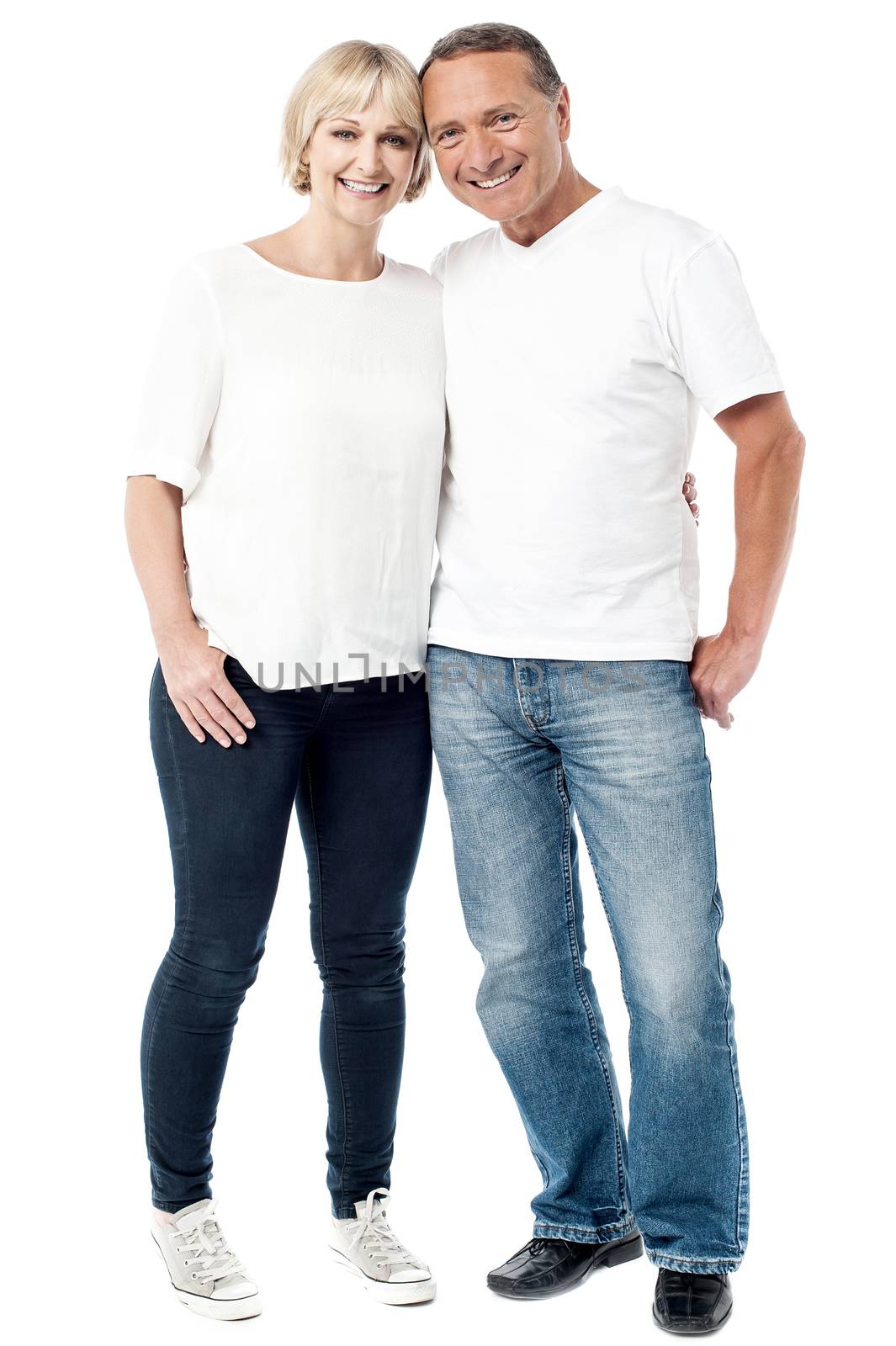 Full length portrait of happy smiling couple standing