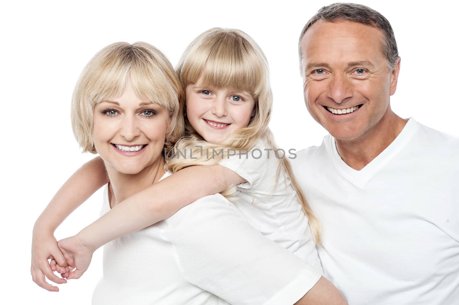 Cute little girl posing with her father and mother