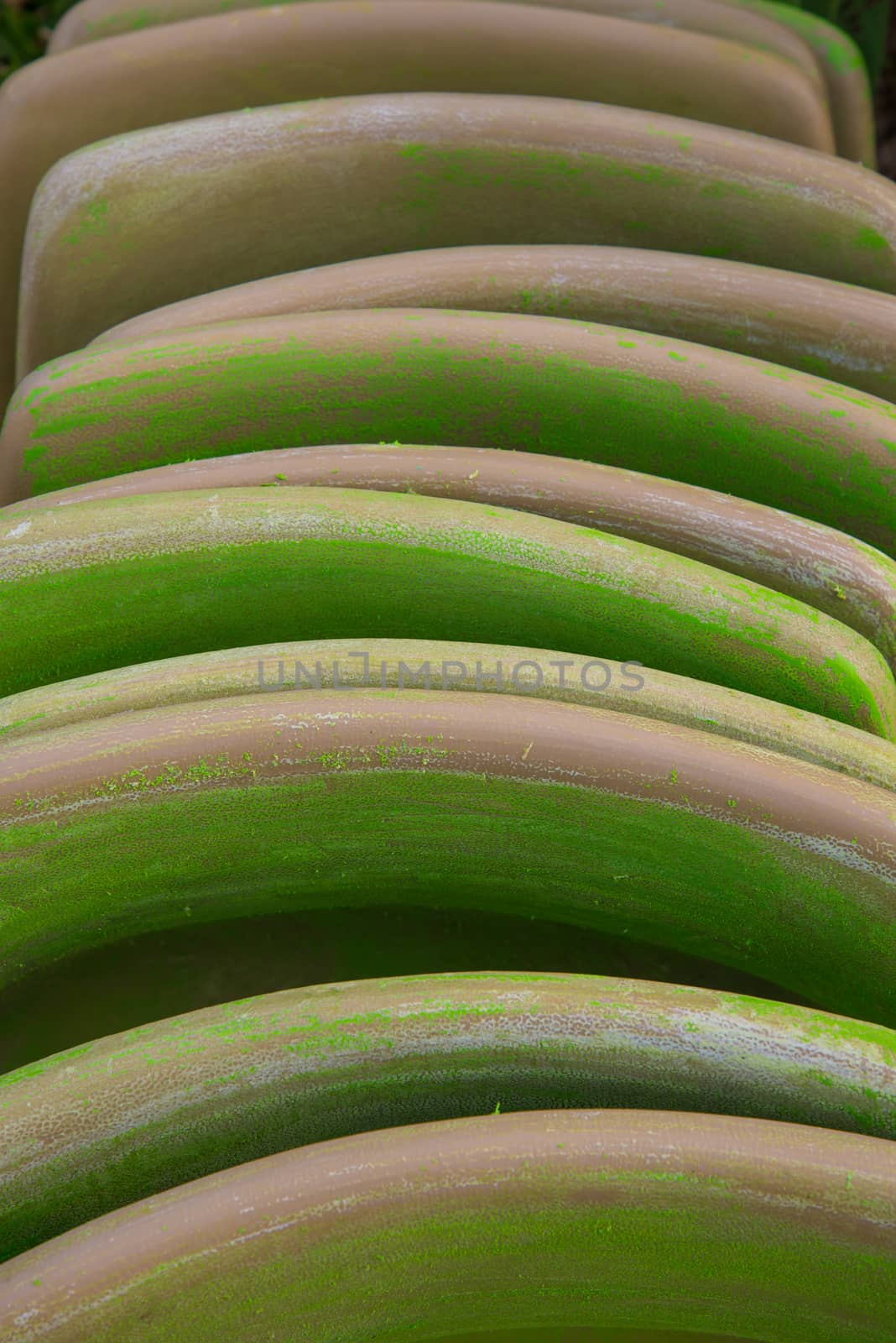 The backrest of the chair stacked for background.