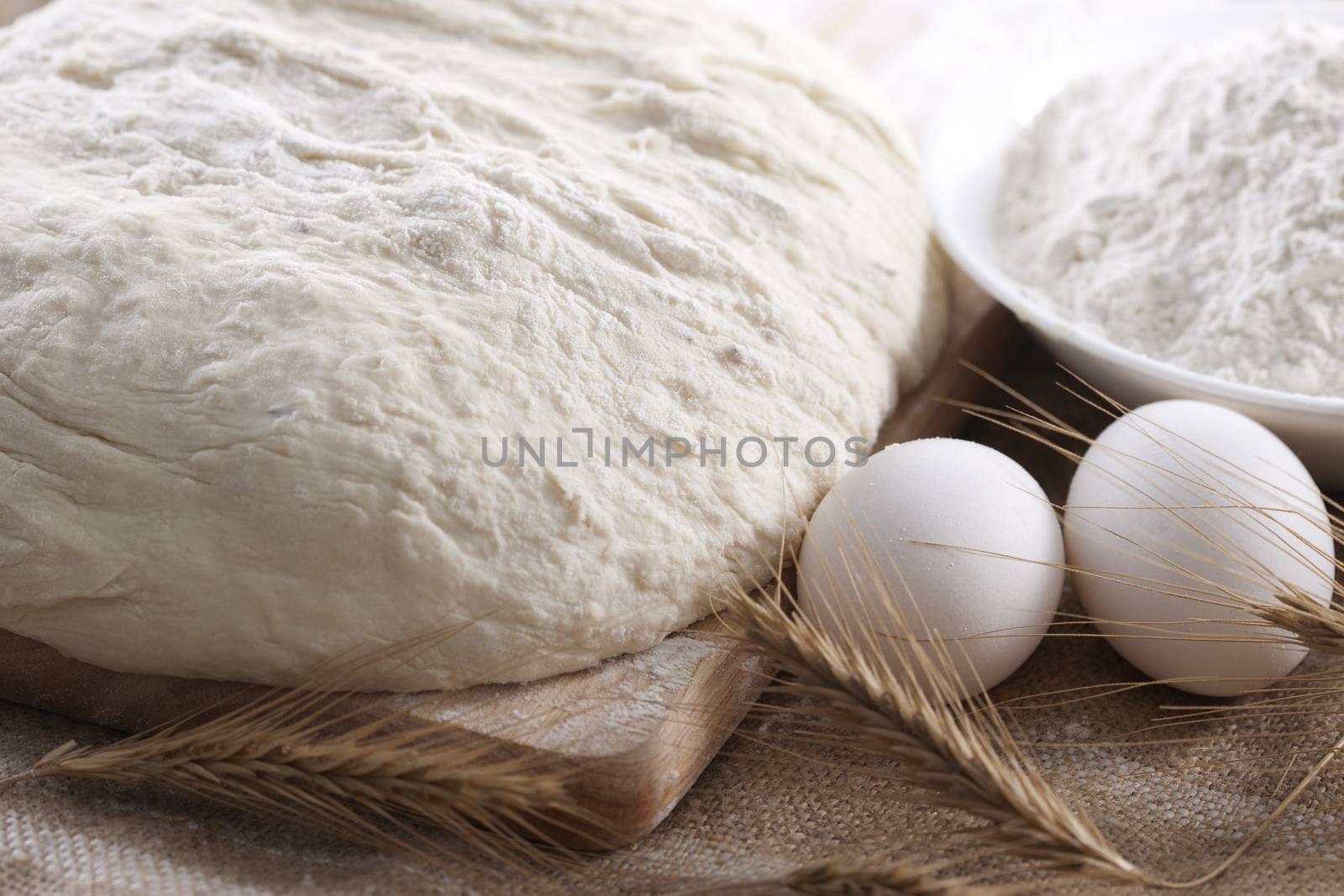Baking fresh bread background, dough
