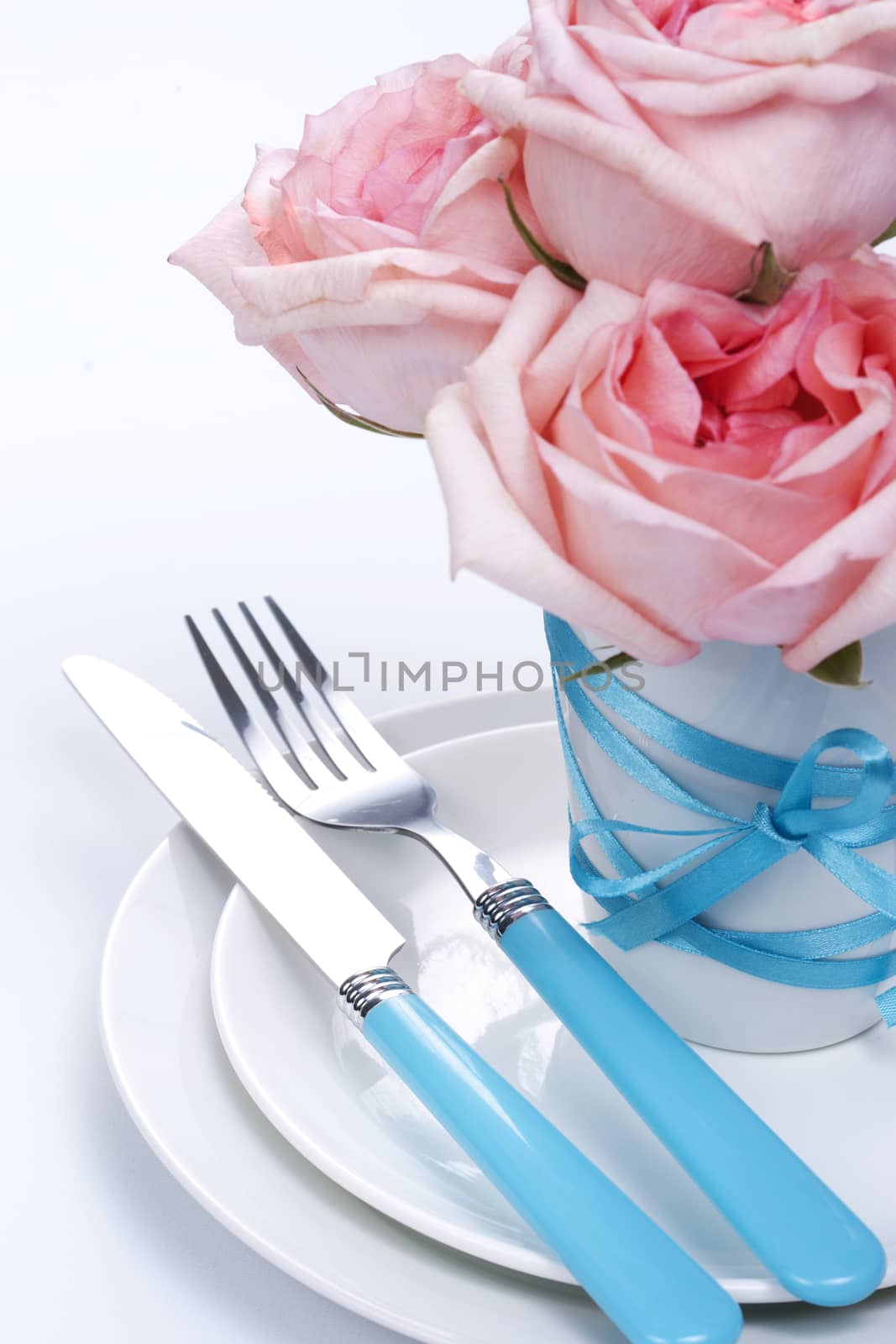 Romantic table setting with roses