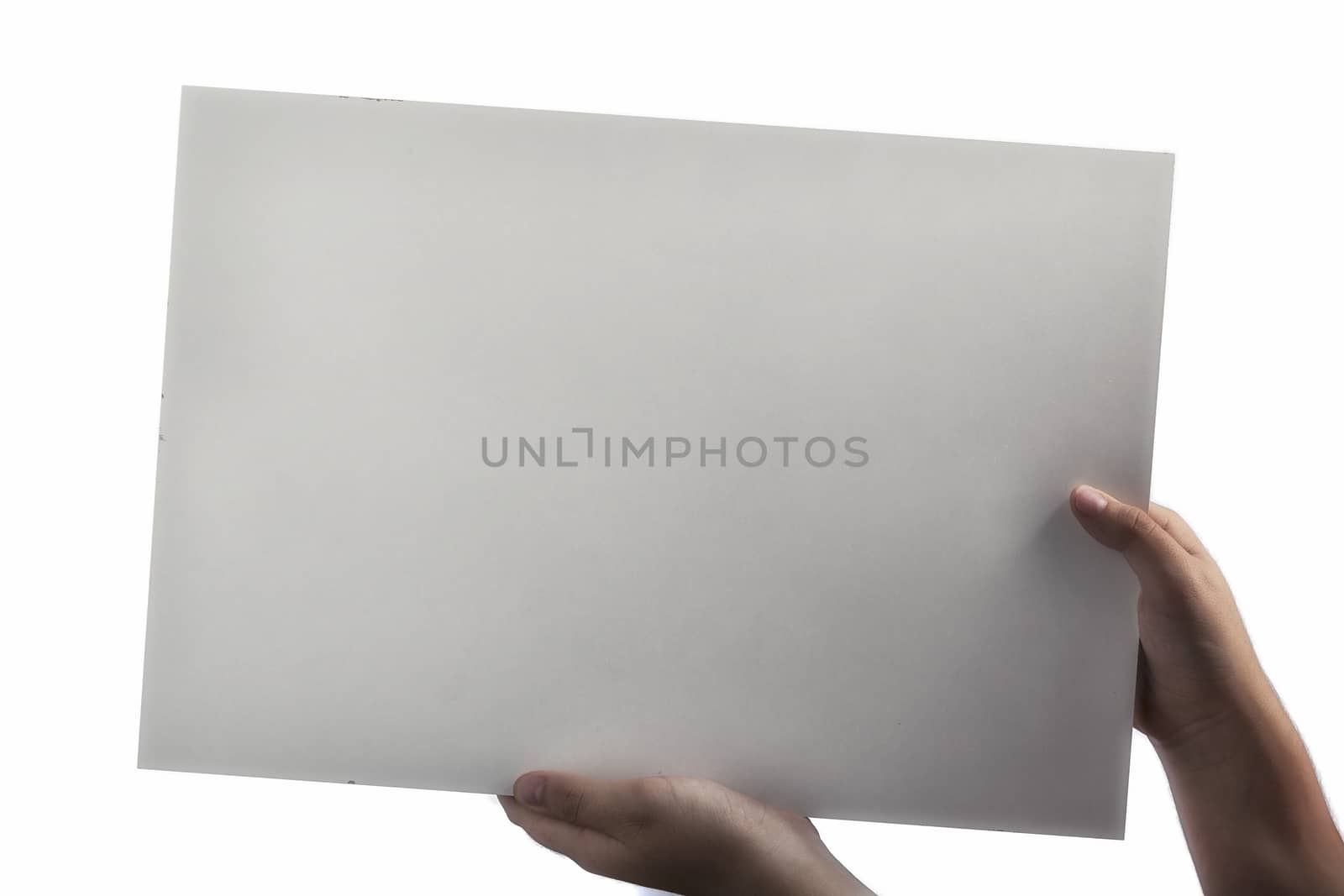 White Plastic laminate sign held up by hands by paocasa