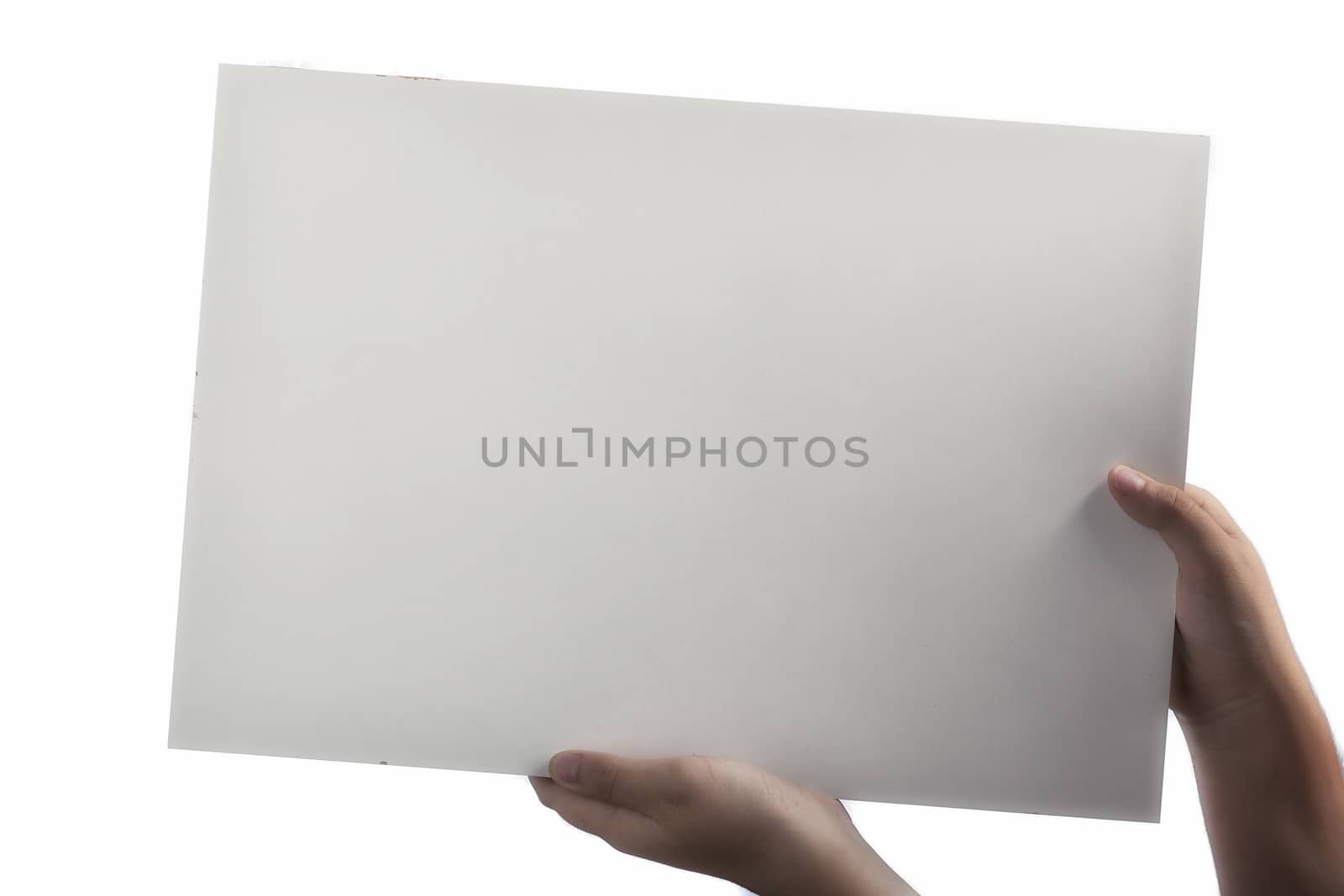 White Plastic laminate sign held up by hands by paocasa