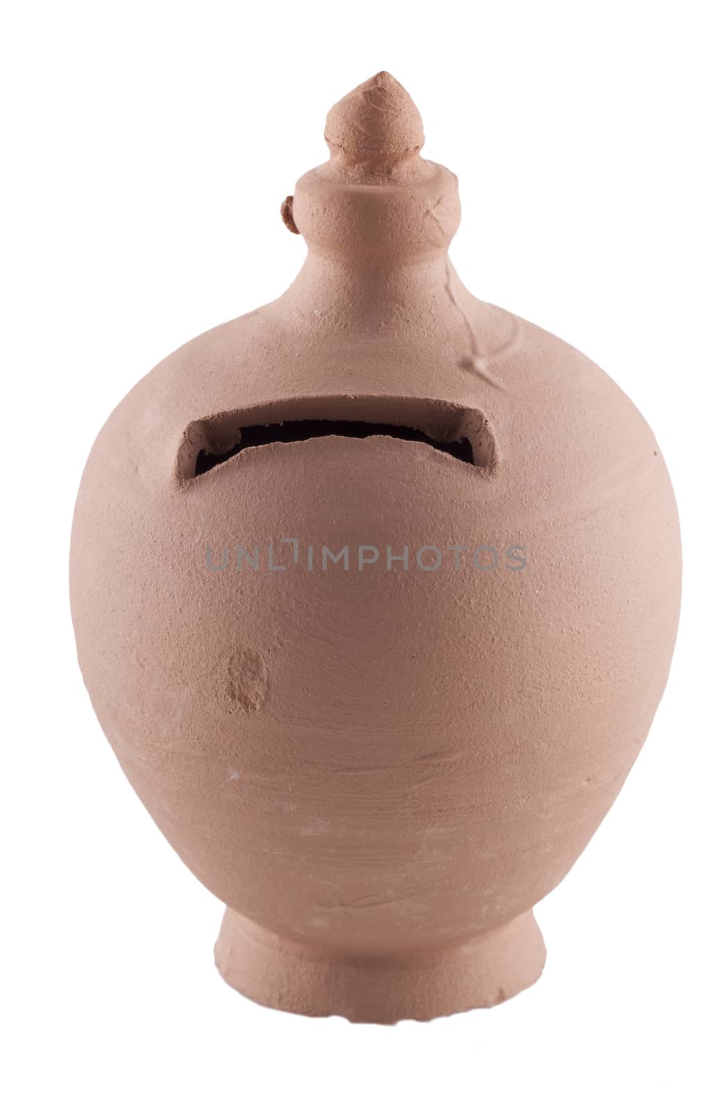 A terracotta piggy-bank isolated over white background