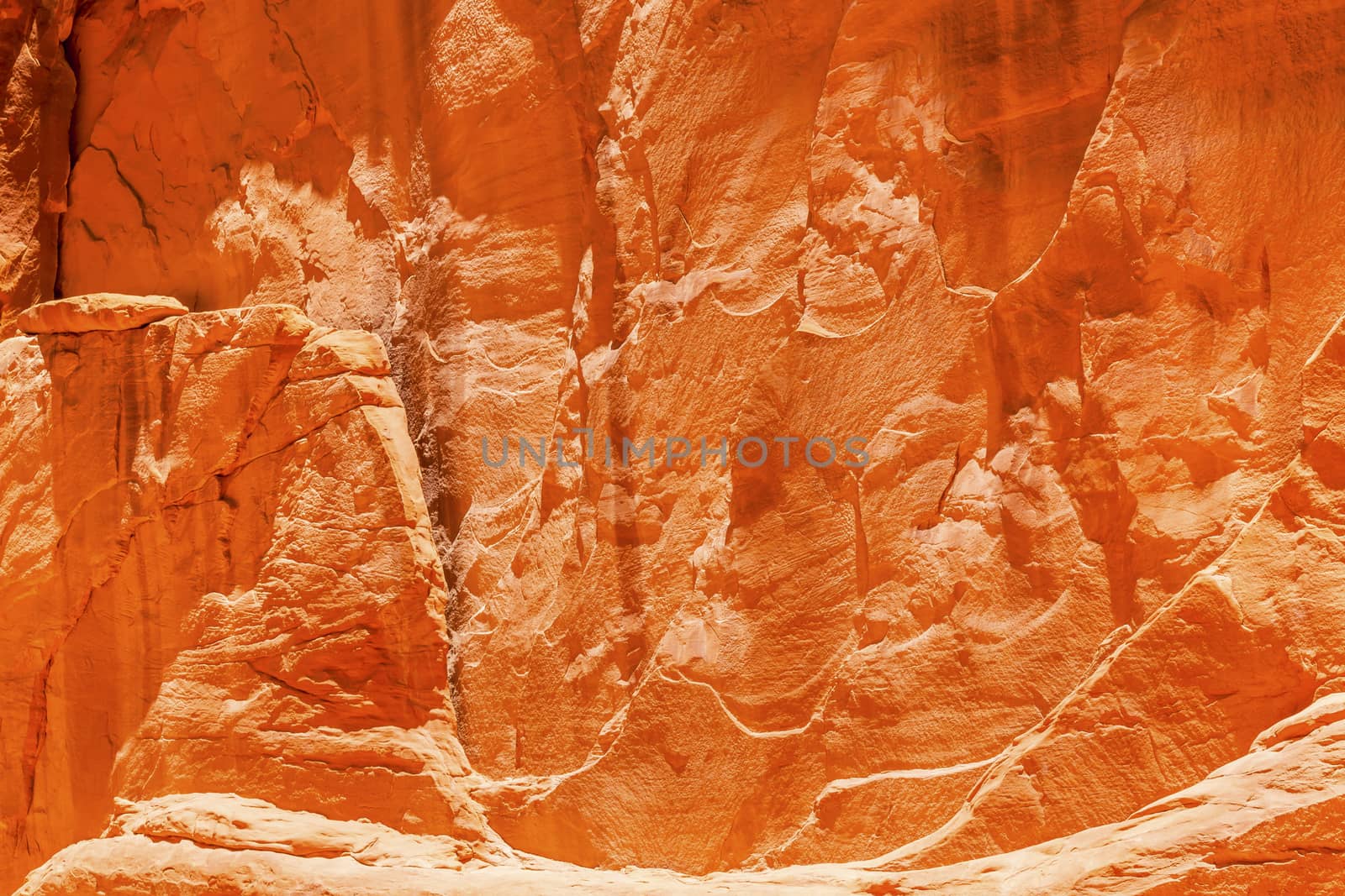 Orange Yellow Sandstone Rock Canyon Abstract Sand Dune Arch Arches National Park Moab Utah USA Southwest. Wind and Sandstone canyon walls create many abstracts close up.  