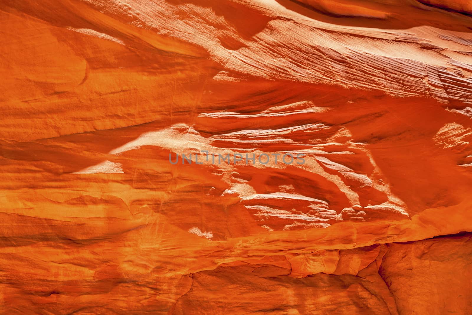 Orange Yellow Sandstone Rock Canyon Abstract Sand Dune Arch Arches National Park Moab Utah USA Southwest. Wind and Sandstone canyon walls create many abstracts close up.  