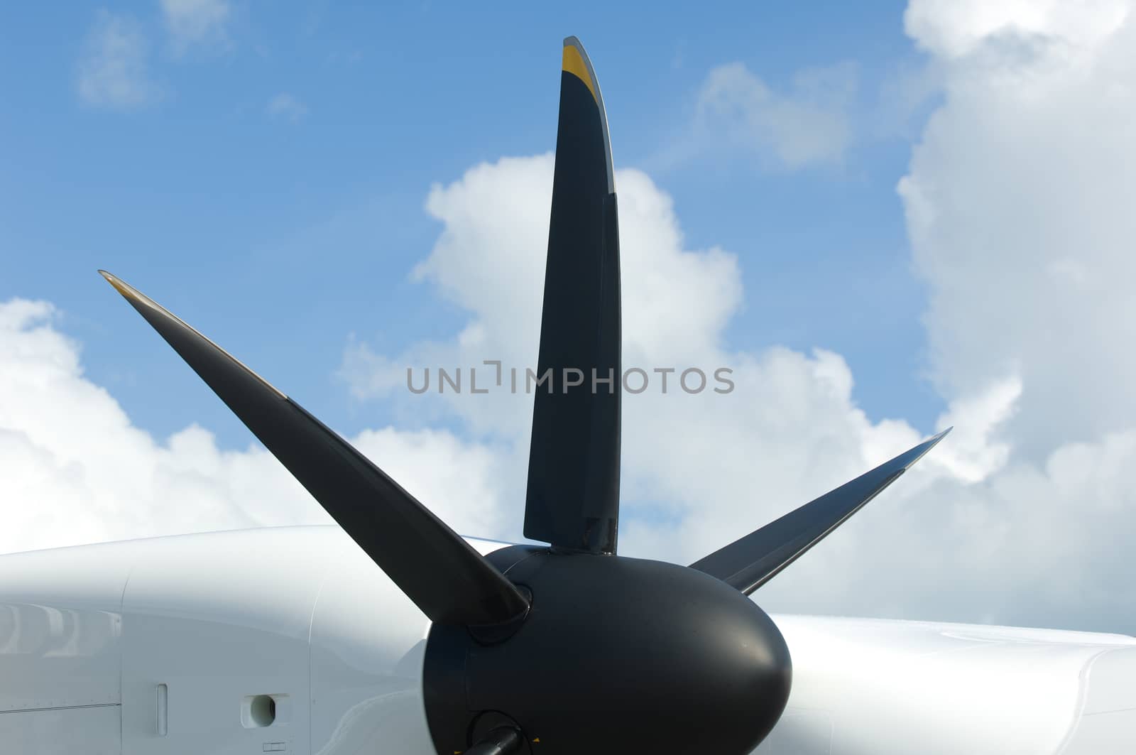 Detail of modern 6-blade propeller of turbo-prop commuter aircraft.