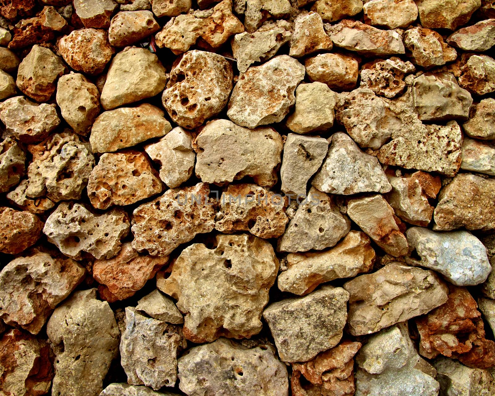 Background of Old Damaged Stones with Concrete Smoothing closeup