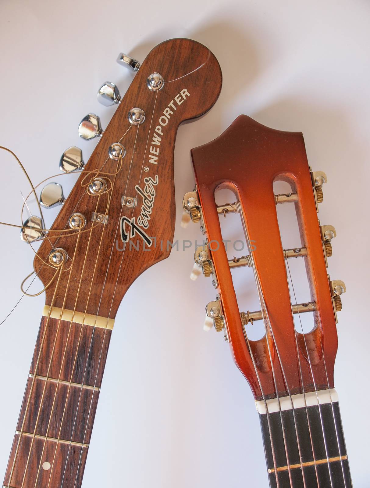 Fender guitar and generic folk guitar by paolo77