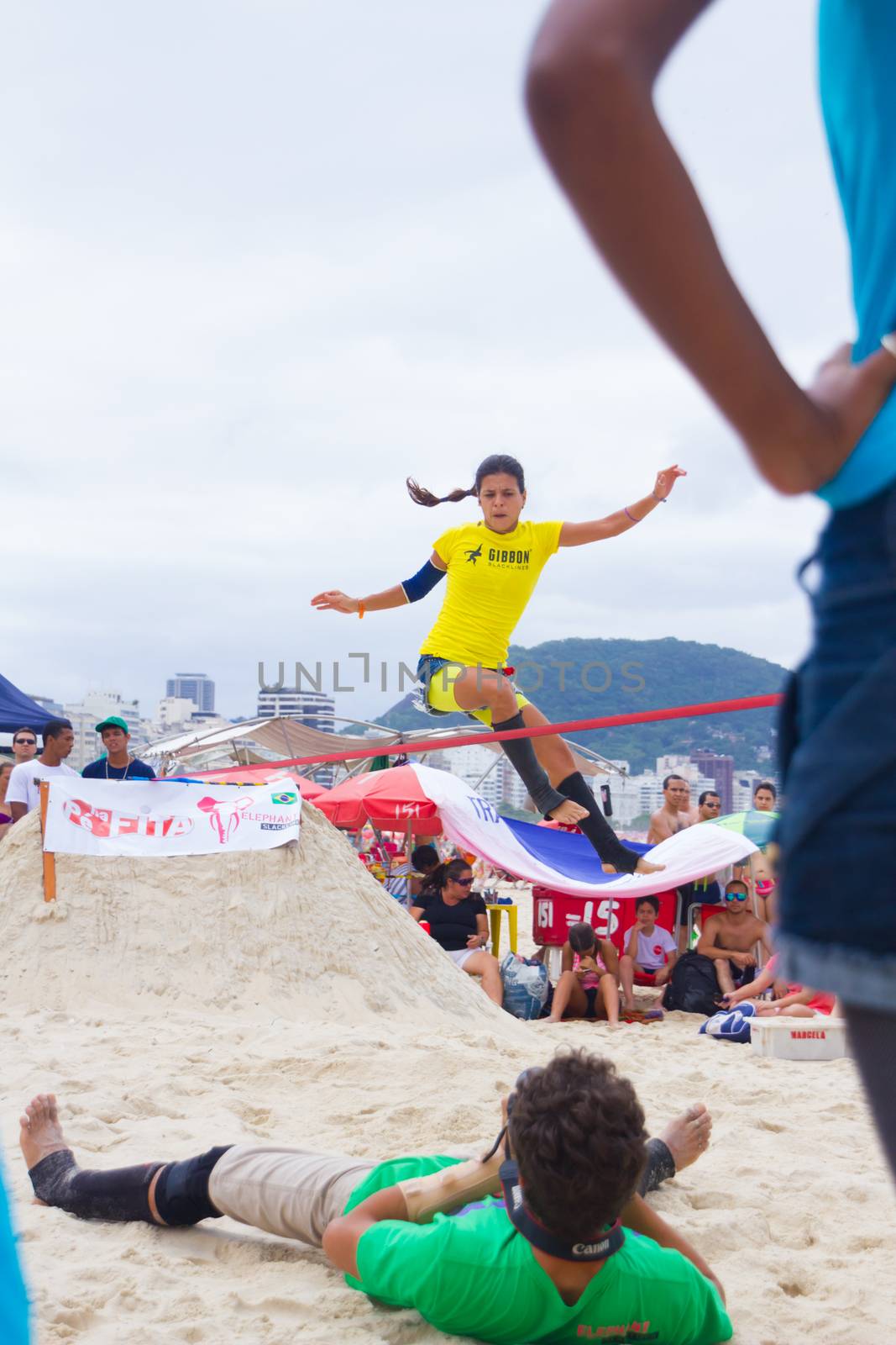 RIO DE JANEIRO - NOVEMBER 03 2012: Slackline contestant on the sands of Copacabana in Rio Elephant Cup tournament, held on November  03, 2012 on Copacabana, Rio de Janeiro, Brazil.