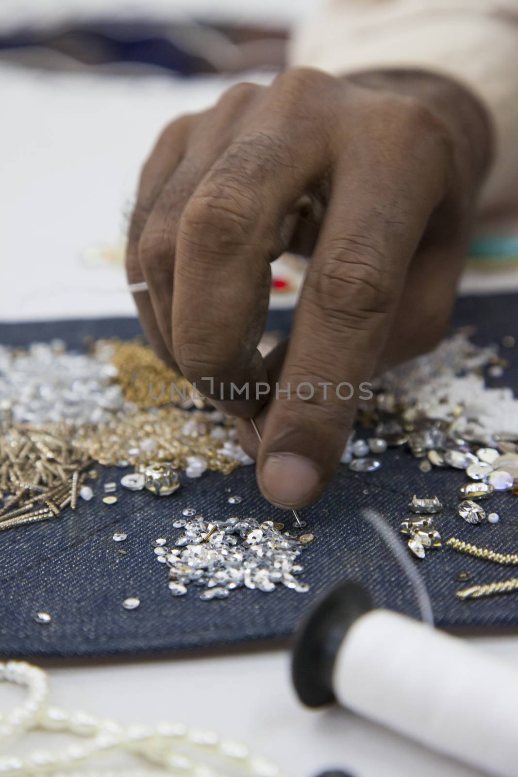 Tailor sewing embroidery