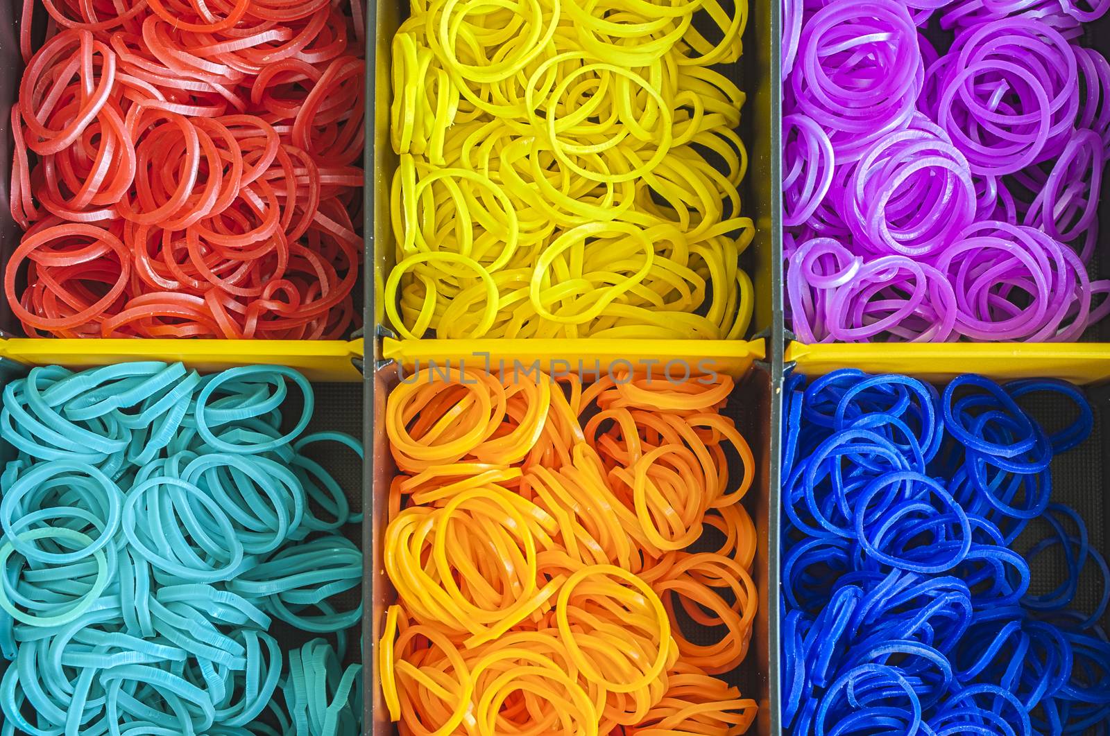 Colorful Rainbow loom rubber bands in a box by Havana