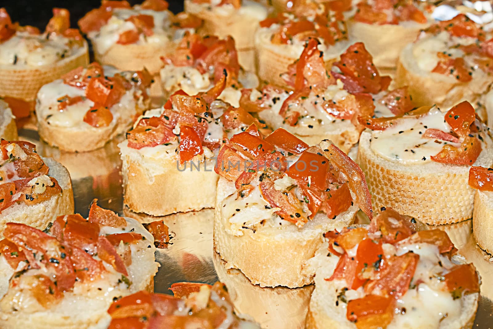 Bruschetta with tomato mozzarella garlic and fresh herbs