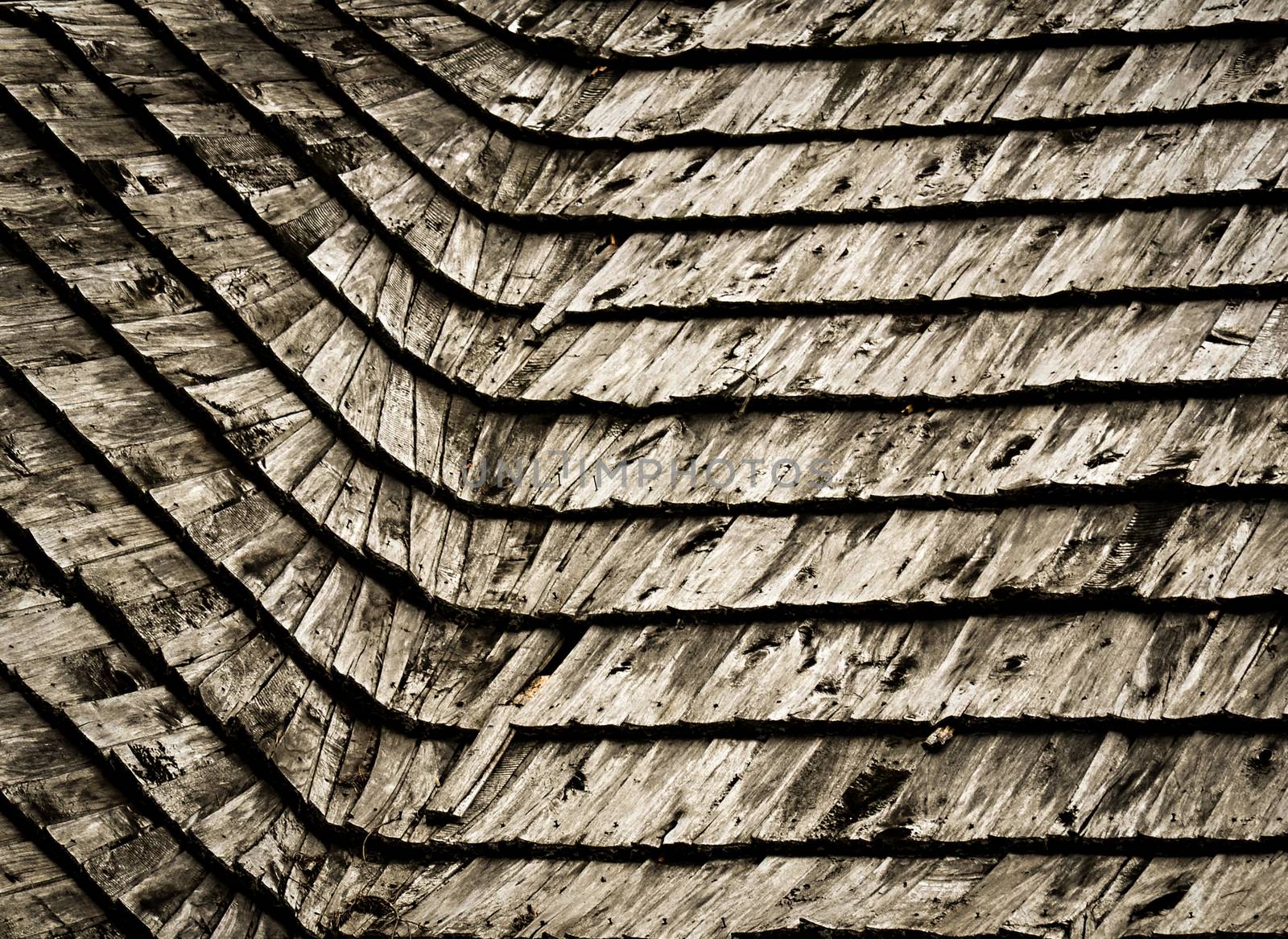 background or texture old damaged wooden shingle roof