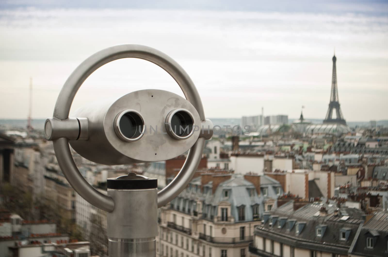 binoculars and panoramic of Paris by NeydtStock