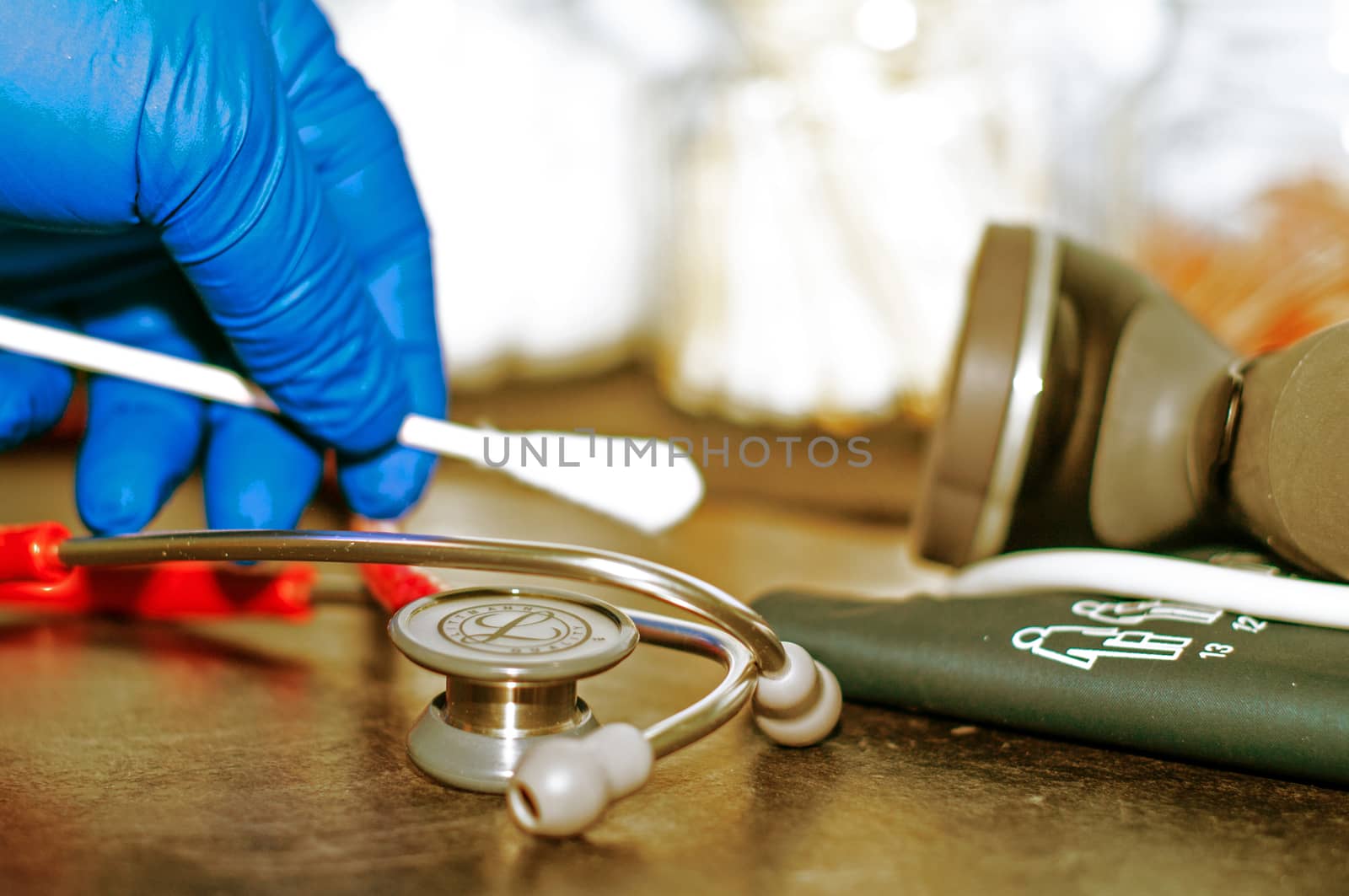 Red Stethoscope with hand and swab by edcorey