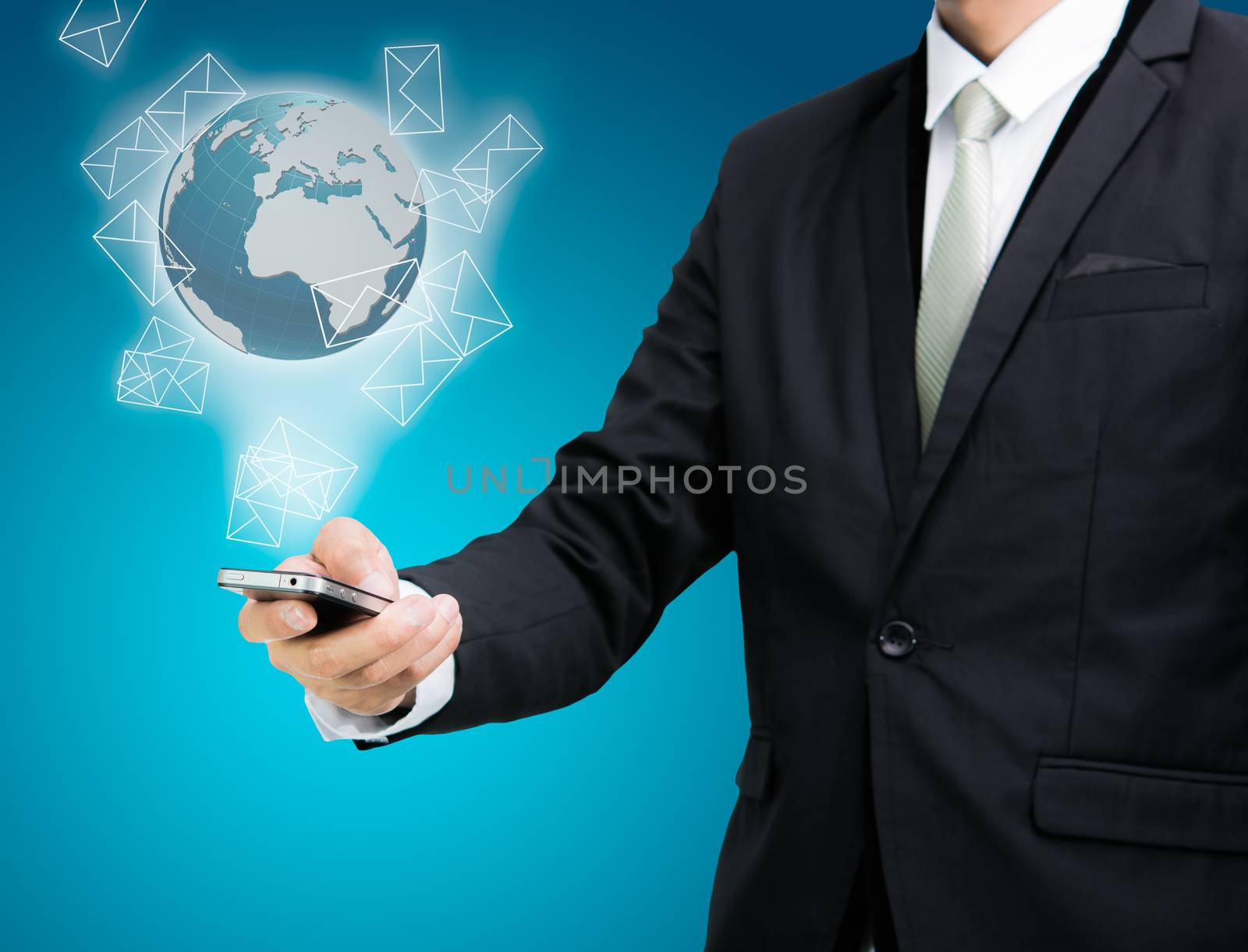 Businessman standing posture hand hold mobile phone Global Marke by Sorapop