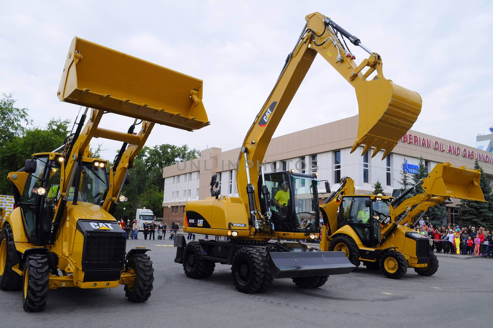 City Day of Tyumen, on July 26, 2014, show of dancing excavators