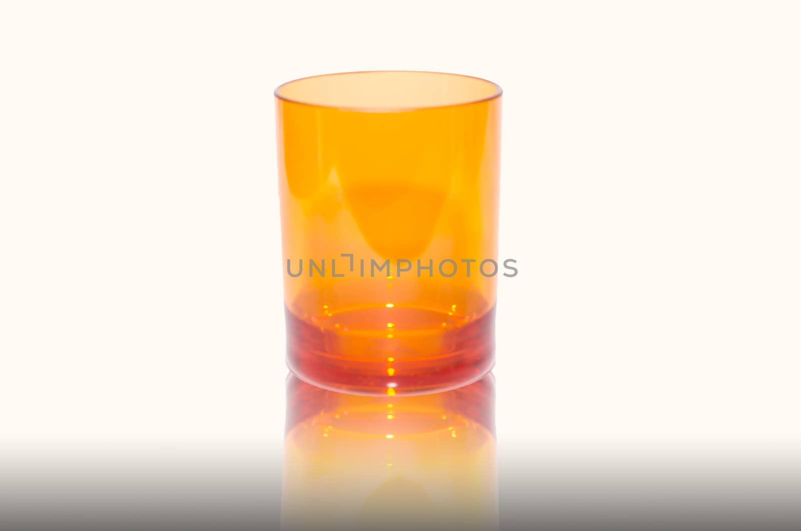 Orange plastic cups isolated on white background.