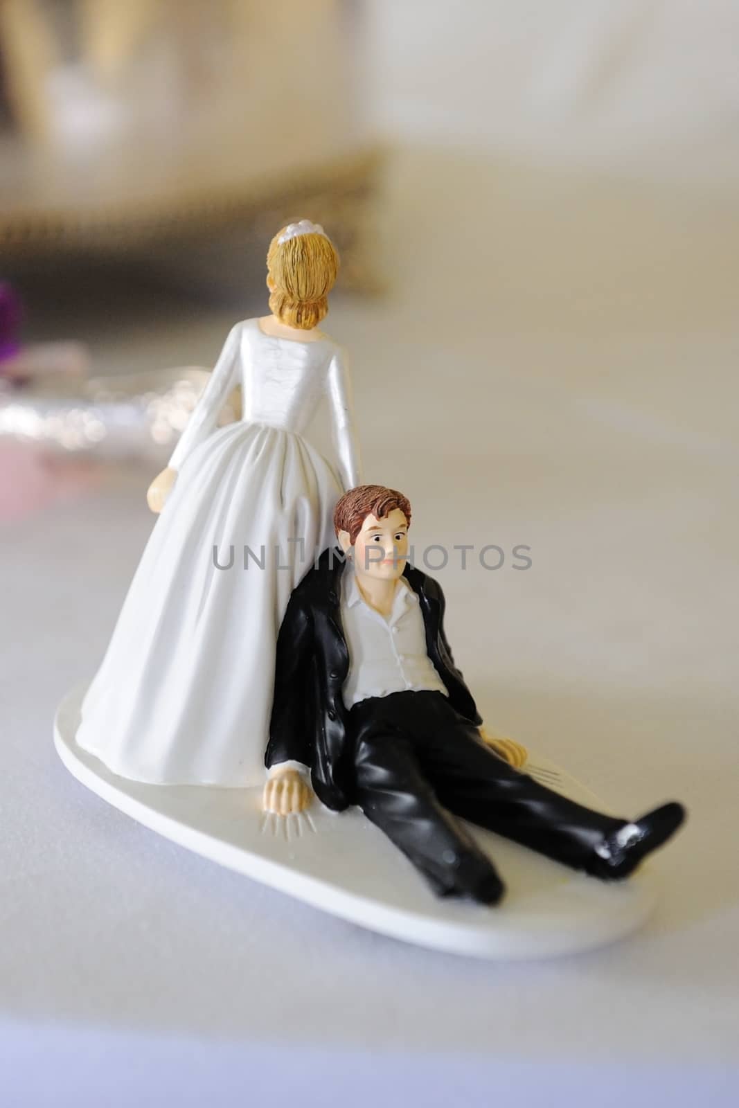 Comedy cake decoration at wedding reception.