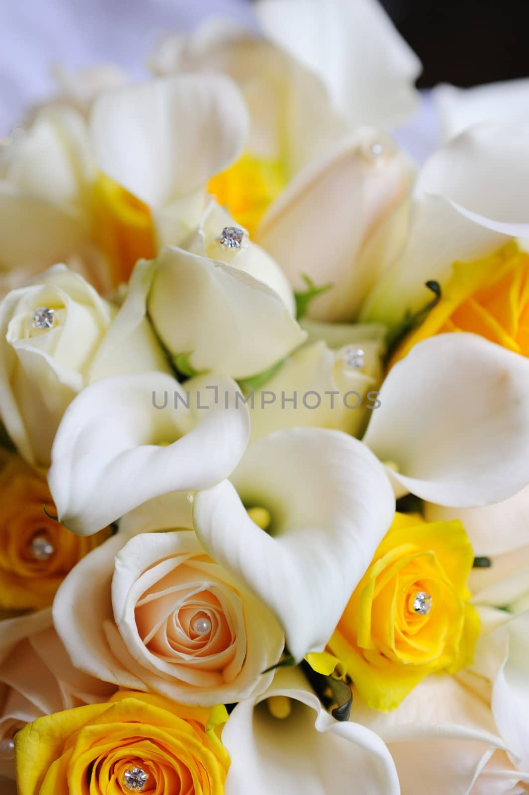 Brides yellow flowers. by kmwphotography