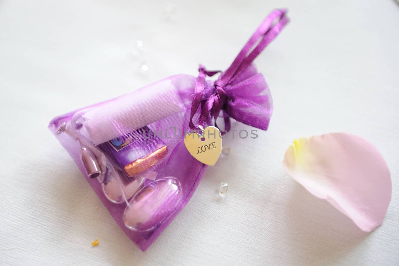 Goody bag at wedding reception. Purple color.