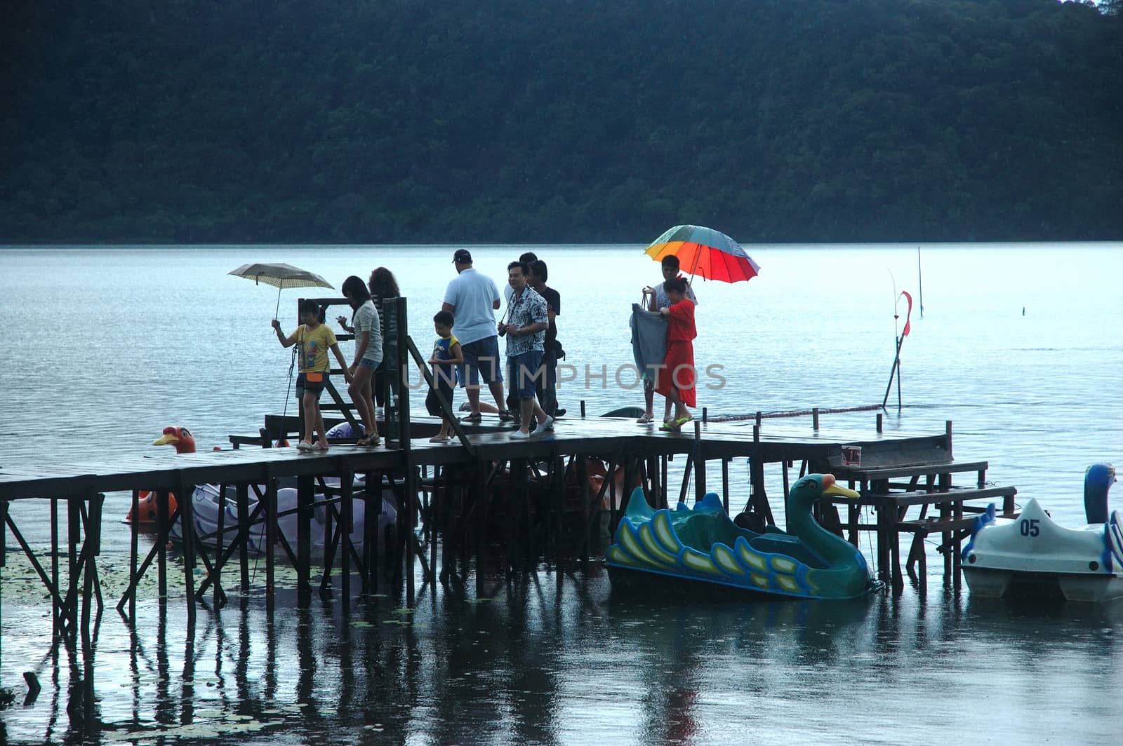 tourists at ulun datu temple by bluemarine