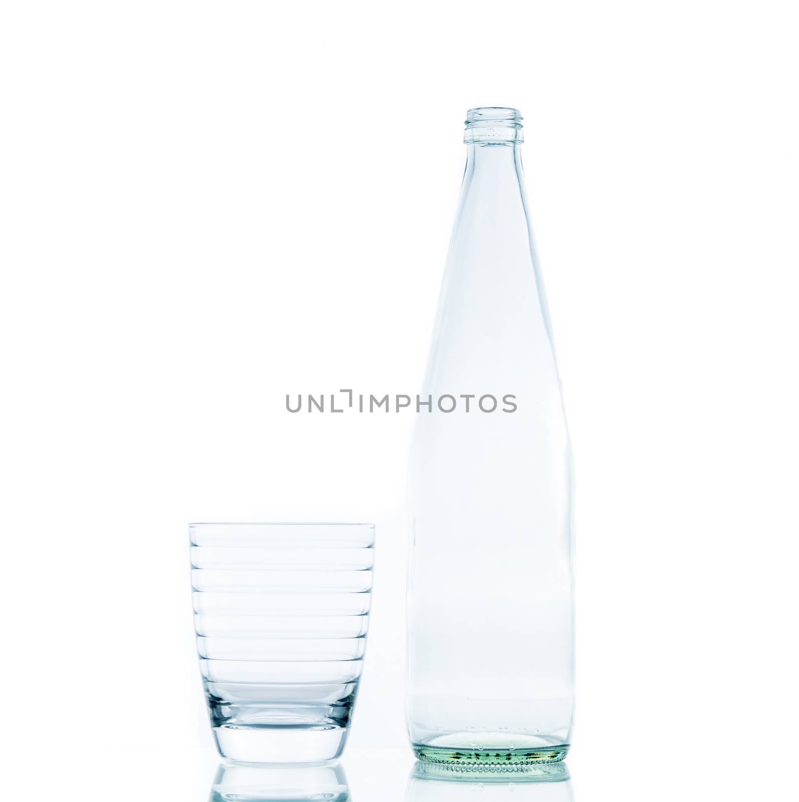 Bottle and Glass water clear isolate on over white background